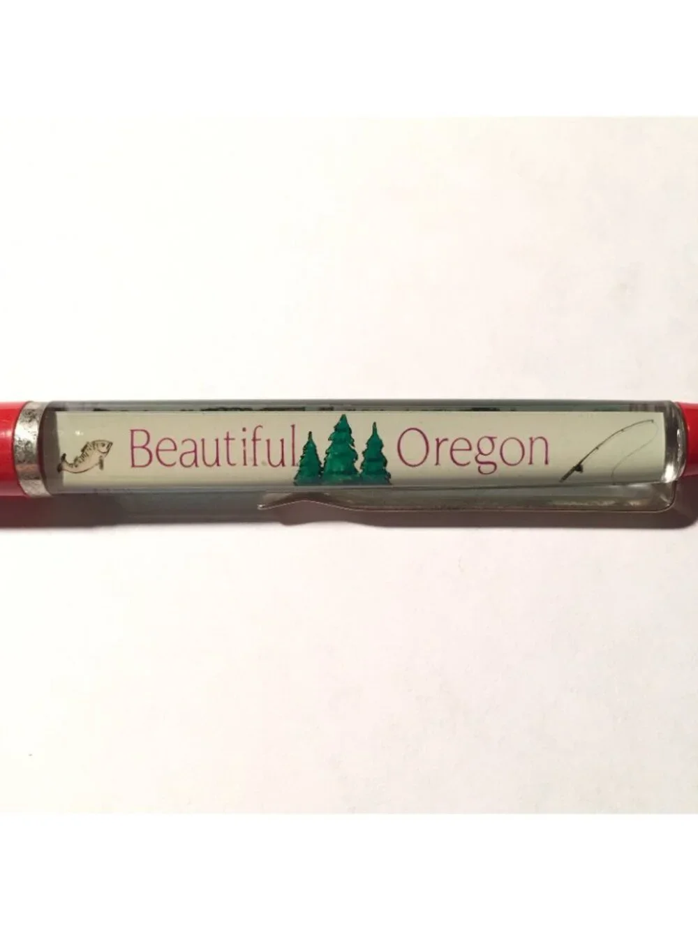 Beautiful Oregon Floaty Pen Fisherman Moves Past Lake Forest Mountains Souvenir